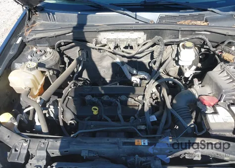 2009 Mercury Mariner Premier из США, поврежденный, VIN 4M2CU87729KJ12944